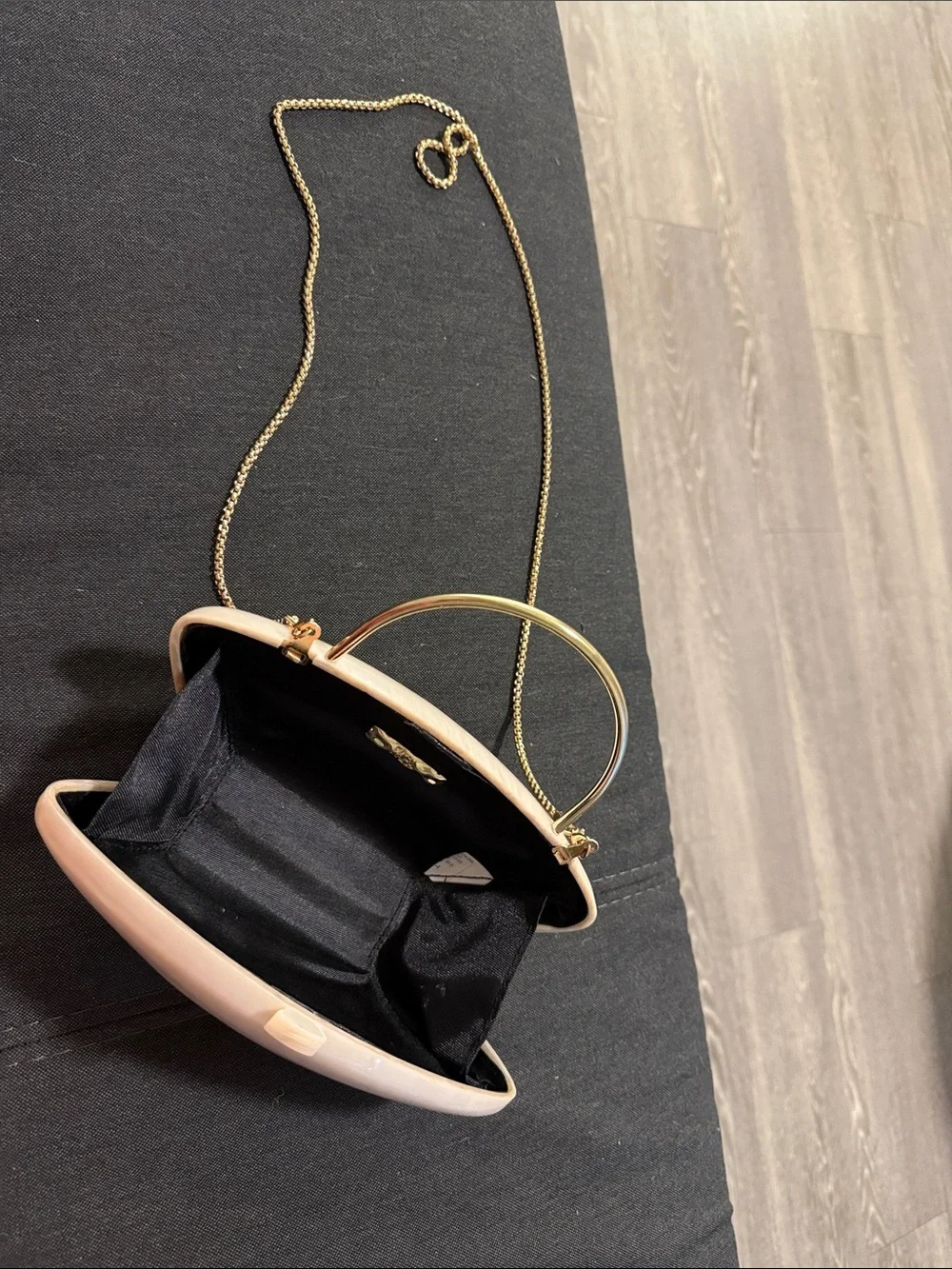 Elegant Cream Clutch with Gold Chain